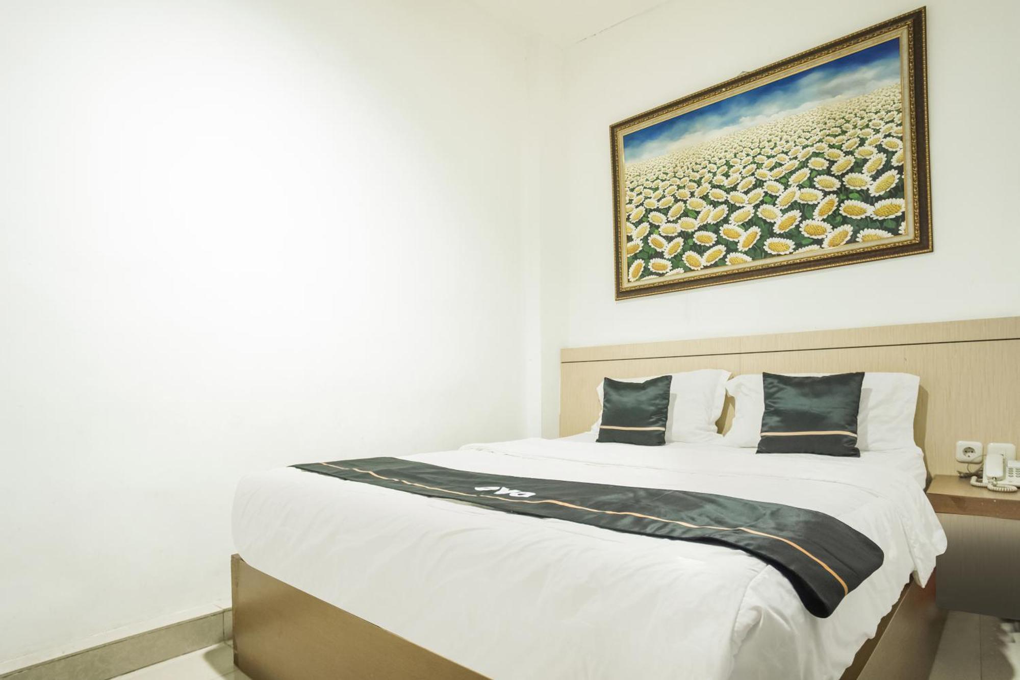 Hotel Townhouse Oak Ilir Timur I Near Ptc Mall